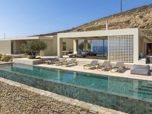 Nobelia's sleek contemporary façade rising above its gorgeous 15m-long infinity pool.