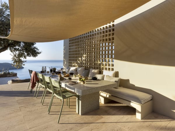 One of two al fresco dining areas to the side of the communal hub.