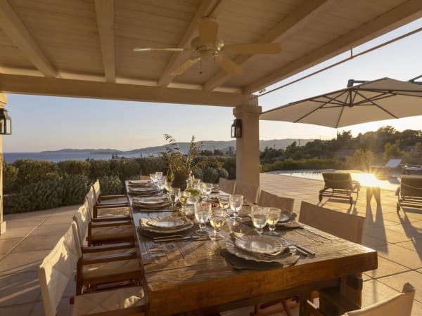The shady, sea-view al fresco dining area down on the pool terrace.