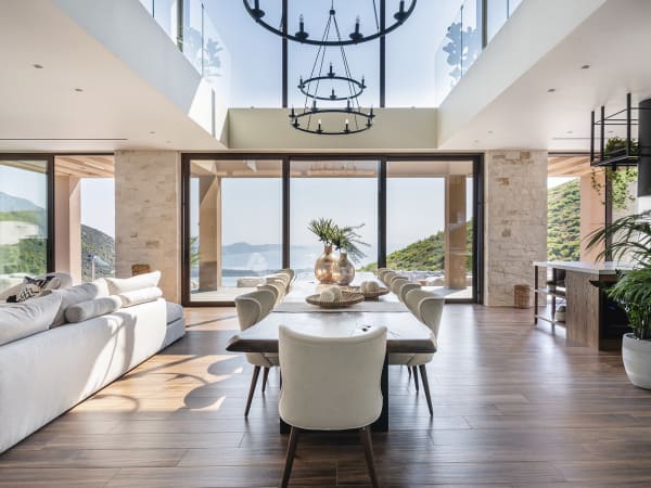 The double-height ceilings above the dining area creates an airy atmosphere.