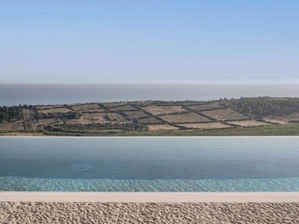 The glorious pool and the views out across Torre Salsa Nature Reserve to the sea.