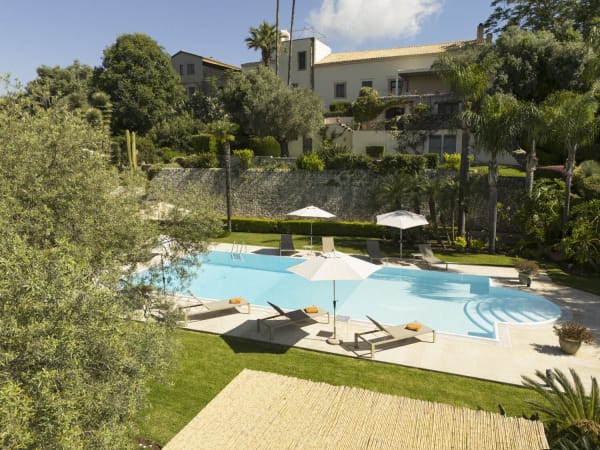 The stunning pool, hanging gardens and villa...